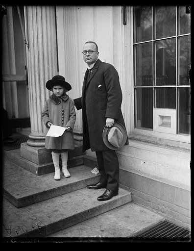 Frances Glover and her father third [...] P.M.G. Glover. Miss Glover presented Pres. Harding with the first of three new [...] one portraying the Arlington amphitheater