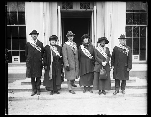 Group wearing Amnesty sashes at White House, Washington, D.C.