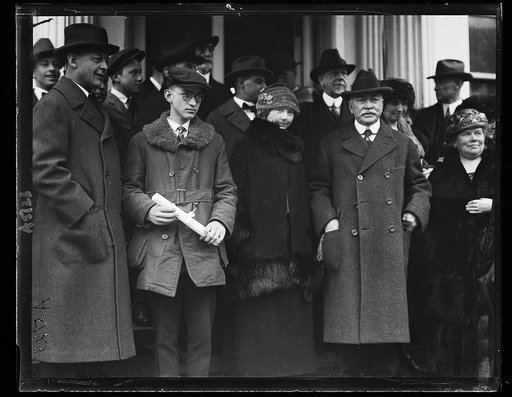 Mrs. Anne Rogers [...] of Sterling, Colo. and J.S. Loomis of Limerick, N.Y., are presented with diploma by Pres. Harding. Mrs. Rogers for writing the best safety lesson and Mr. Loomis for writing the Best on Grange. Left to rt.: Sen. Wadsworth, J.S. Loomis, Mrs. Rogers and Sen. Phipp of Colo. [White