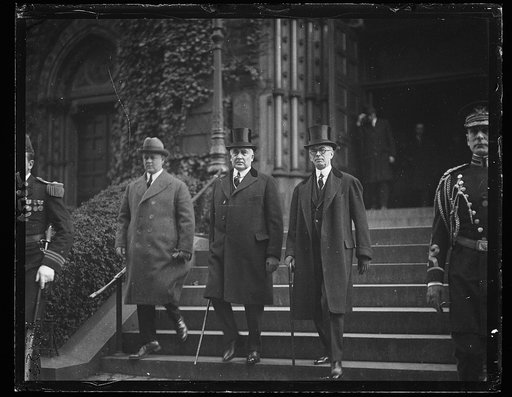 Harding and Harvey leaving St. Patrick Church where memorial mass for recently assassinated Pres. of Poland