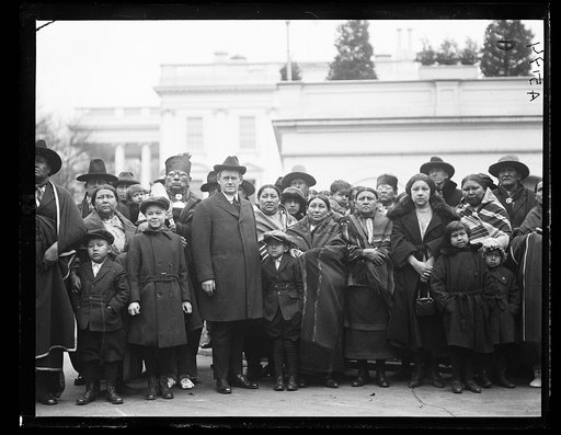 Group of Osage Indians at White House with Commissioner Burke who asked the Pres. for an increase in their allowance
