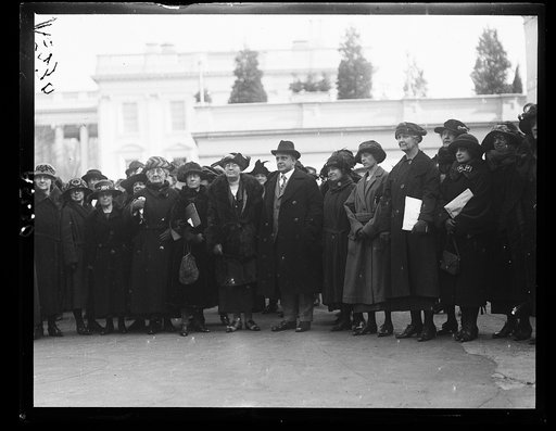 Delegates to the Women's Industrial Conference now in session at White House photographed with Secy. Davis