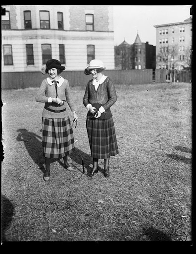 Debutantes playing horse shoes. Left to right: Elizabeth Beale, Virginia Edwards