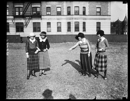 Debutantes playing horse shoes. Left to right: Virginia Edwards, Emma Stitt, Mary Stitt, and Elizabeth Beale