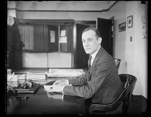 Col. T.J. Ijams, at his desk in U.S. Veterans Bureau, been promoted from chief of the district organization to the post of executive officer