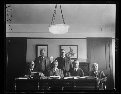 Commission sent by Secy. of Labor Davis to the Hawaiian Islands to investigate labor problems and to report on advisability of allowing Chinese Labor to enter the Islands as requested by Hawaiian govt. First row, left to right: L.E. Sheppard, Secy. Davis, O.R. Hartwig, and Hywel Davies. Standing: Jo