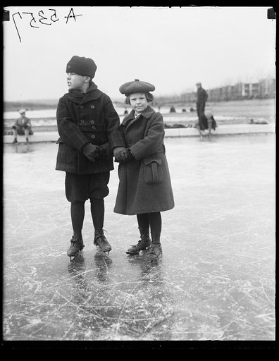 Secy. Denby's children skating on Lincoln Memorial reflecting pool