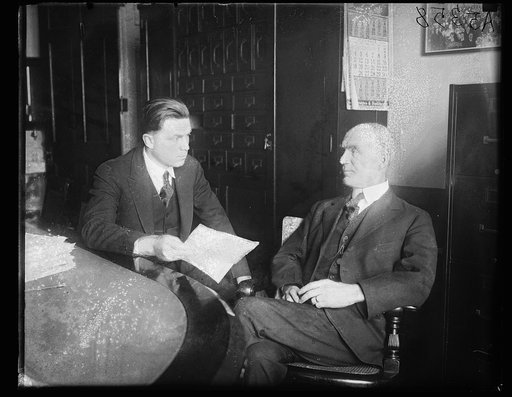 Lowell Fess (left) son of Senator-elect Fess of Ohio, at their desk