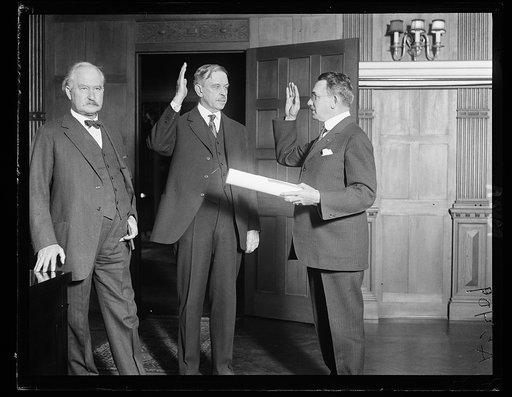 Hubert Work being sworn in