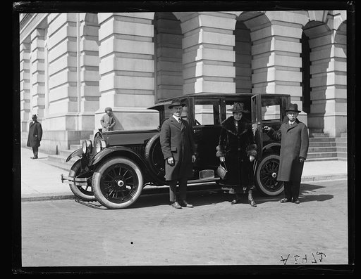 Group with automobile. U.S. Capitol, Washington, D.C.