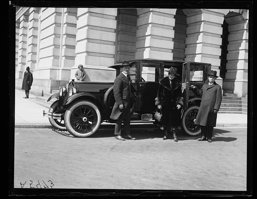 Group with automobile. U.S. Capitol, Washington, D.C.