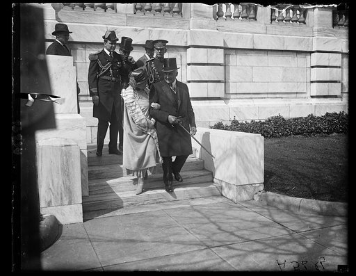 Pres. and Mrs. Harding leaving Continental Hall after attending D.A.R. Congress