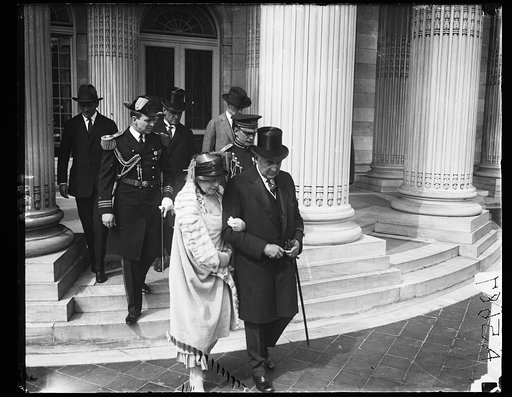 Pres. and Mrs. Harding leaving Continental Hall after attending D.A.R. Congress