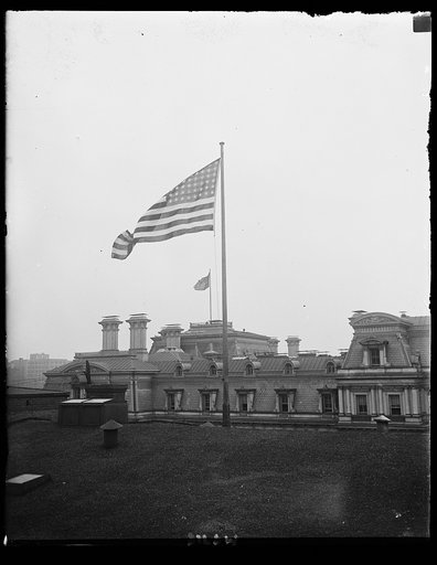 Amer. Flag [State, War and Navy Building in background. Washington, D.C.