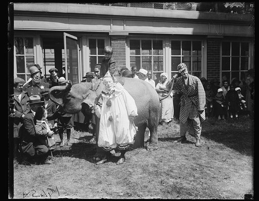 Clowns perform for sick and crippled at Children's Hospital