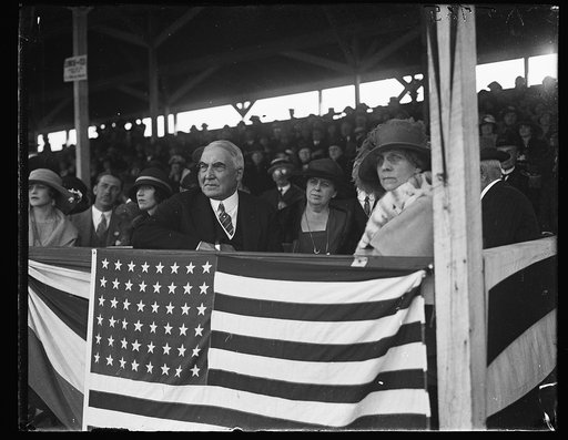 President and Mrs. Harding in stands