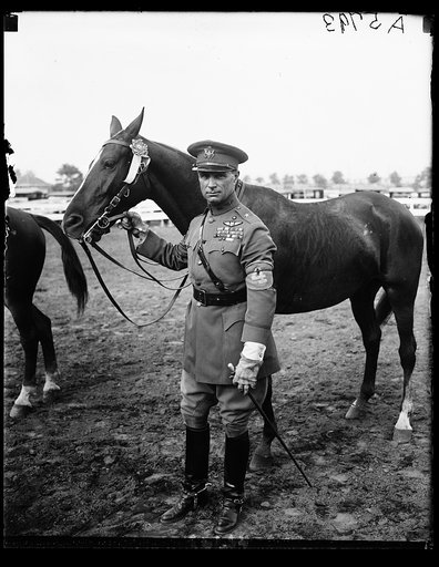 Gen. William Mitchell, Asst. Chief of the Army Air Service, with horse at Nat'l Capitol horse show