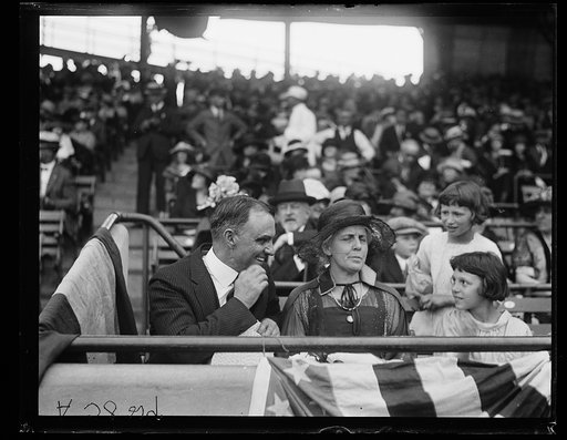 Family group in stadium stands