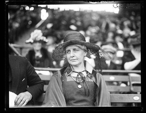 Woman seated at stadium
