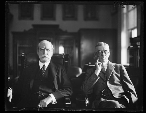 Charles Evans Hughes, left
