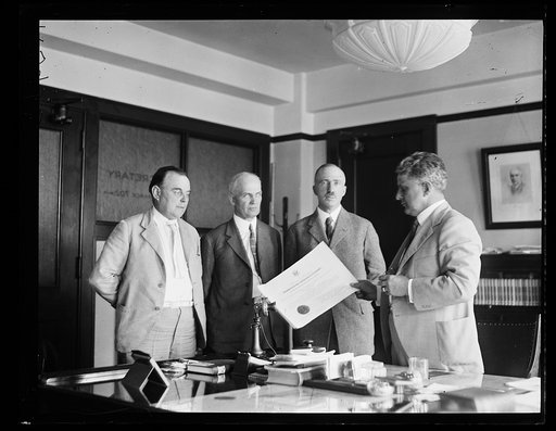 Group; James J. Davis, right