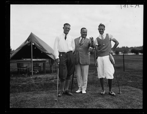 J. Stewart Whitham, left, runner up in golf tournament, J.D. Standish, Jr., center, [...] Michigan donor of Cup, and Dick Walsh, of New York, winner of cup of Nat'l Public Park Golf Tournament