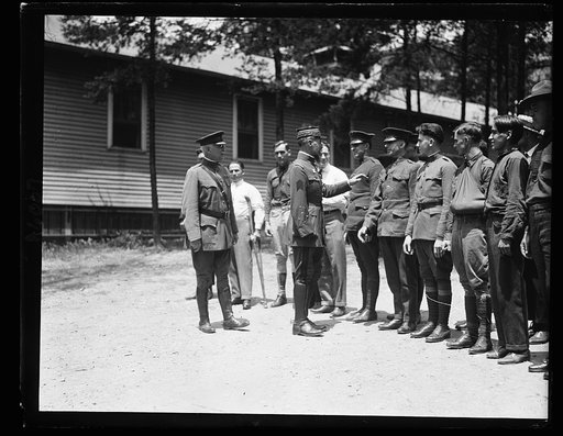 Gen. Henri Gourand, who commanded American troops during the Great War, visiting the soldiers at Walter Reed
