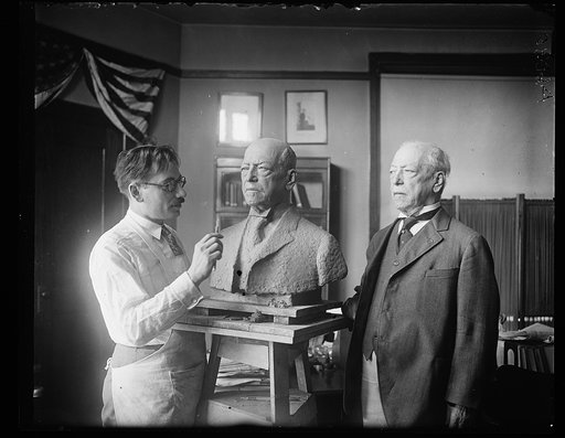Samuel Gompers posing for sculptor