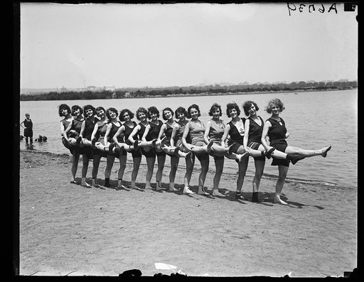 Bathing beauties dancing on beach