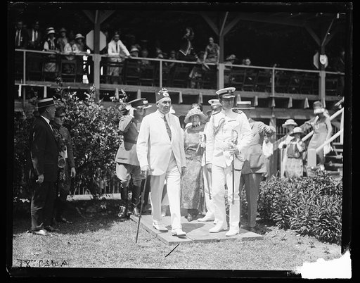 Warren Harding in Shriners fez, Florence Harding, and group