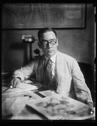 ...] Charge d'Affaires of the [...]an Embassy, at his desk