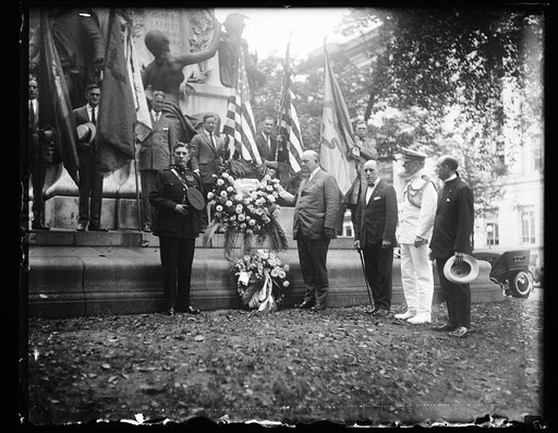 Edwin Denby] placing wreath on Lafayette monument