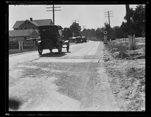 Automobiles driving on road