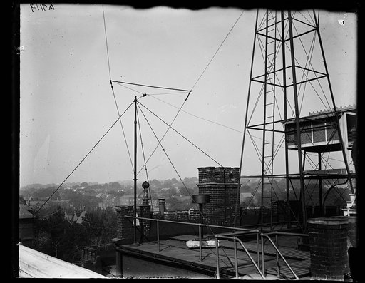Tower, wires, and instrument enclosures on roof of the National Weather Bureau building, Washington, D.C.