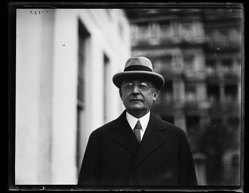 Man at White House; State, War and Navy Building in background. Washington, D.C.