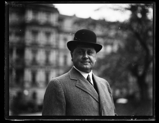 Man at White House; State, War and Navy Building in background. Washington, D.C.