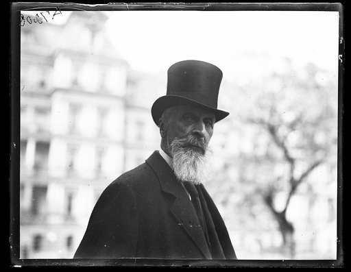 Man at White House; State, War and Navy Building in background. Washington, D.C.