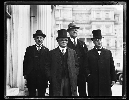 These men presented Pres. Coolidge with the trowel with which he lays the cornerstone of the Geo. Washington memorial [White House, Washington, D.C.