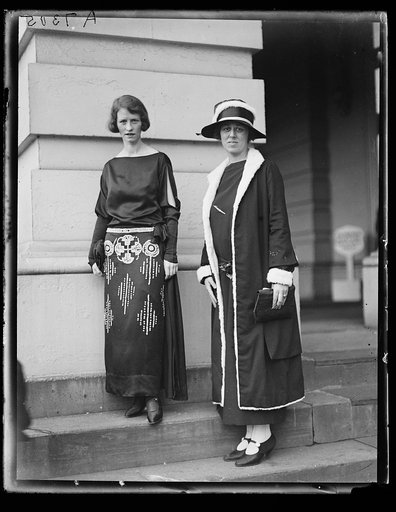 Poet Edna St. Vincent Millay (left) and presiding officer Doris Stevens (right) at the U.S. Capitol for a reading of the "Women's Magna Carta" of the National Women's Party, November 18, 1923