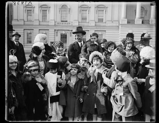 Group of children at U.S. Capitol; Theodore Roosevelt, Jr., holding child, center. Washington, D.C.