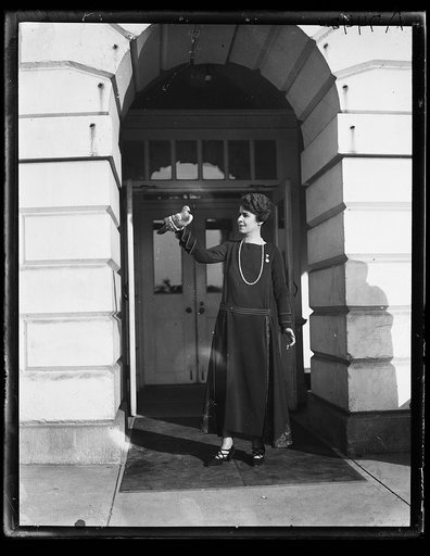 Grace Coolidge and bird. White House, Washington, D.C.