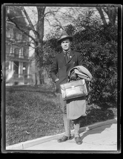 Man; State, War and Navy Building in background. Washington, D.C.