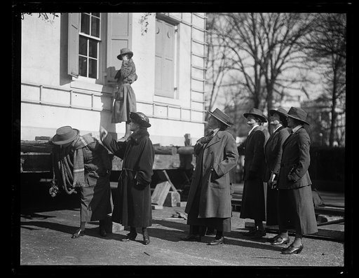 Mrs. Herbert Hoover, center, with the Girl Scouts of America accepting [...] Home" known as the model house [...