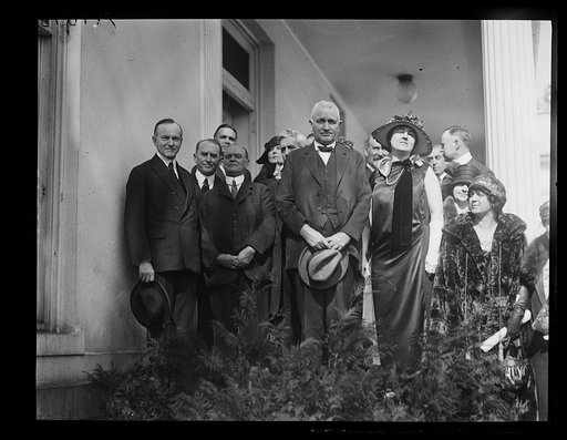 Pres. Coolidge, extreme left, with a committee of prominent good roads leaders from various states