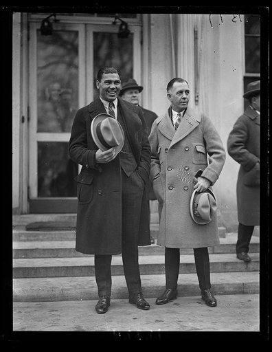 Jack Dempsey and his Manager at the W.H. [i.e., White House