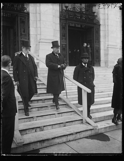 Charles Evans Hughes, left