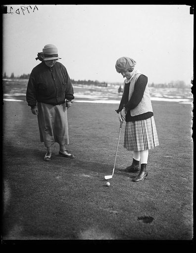Congresswoman Nolan and daughter playing golf