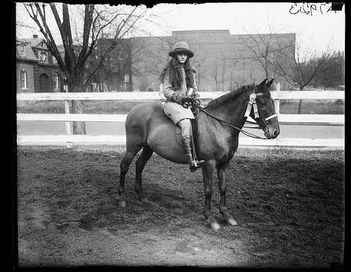 Miss Mary Parker Corning on horseback