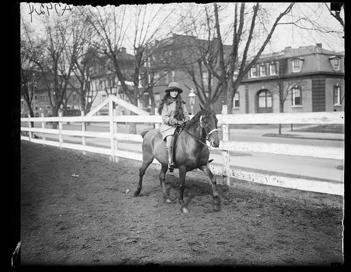 Miss Mary Parker Corning on horseback