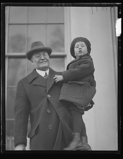 Chmn. T.V. O'Connor of the US Shipping Board introduced his grandson to the Pres. Thomas Holt of N.Y. [?